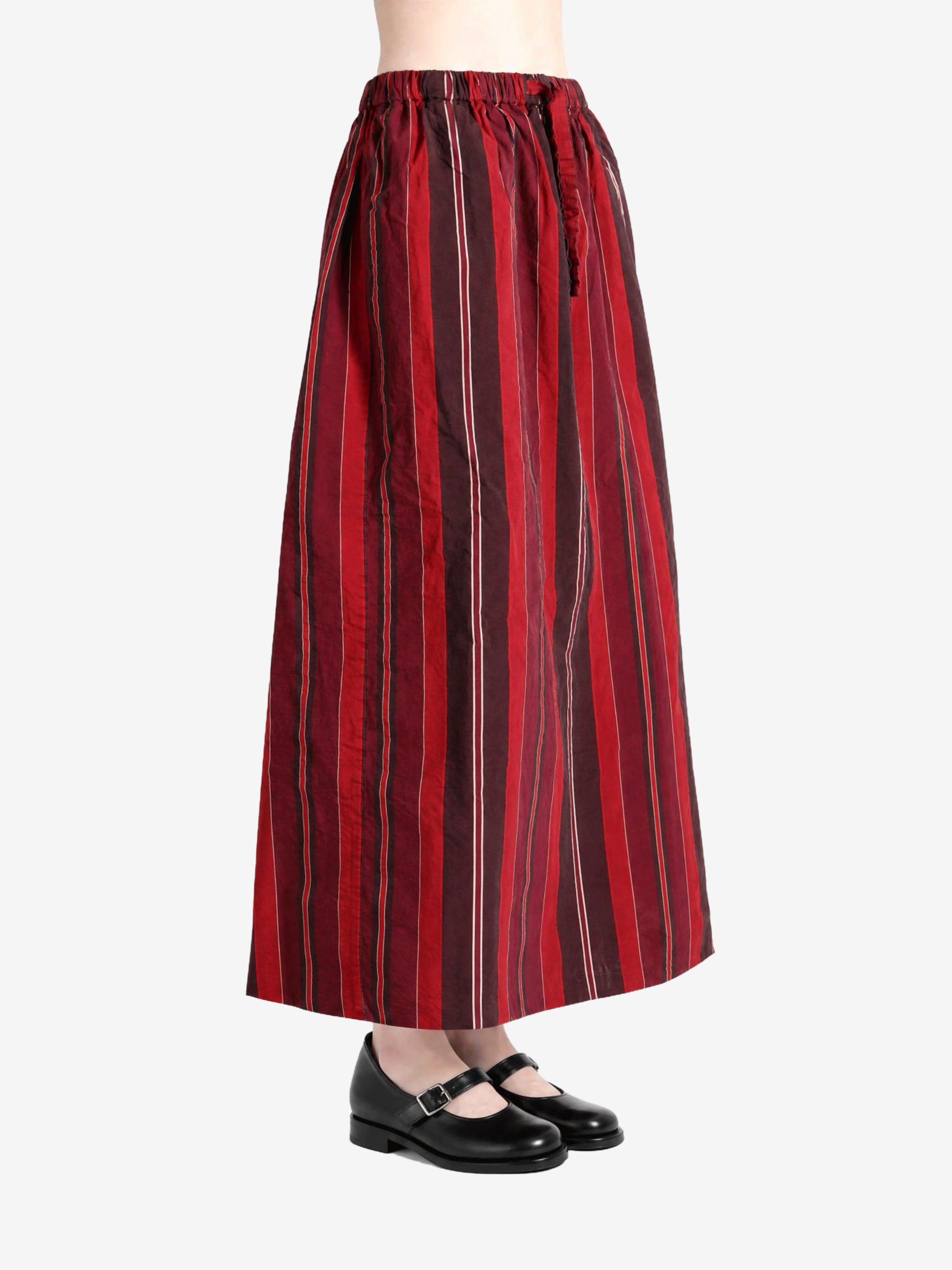 Red skirt worn by a person, showing the skirt fit