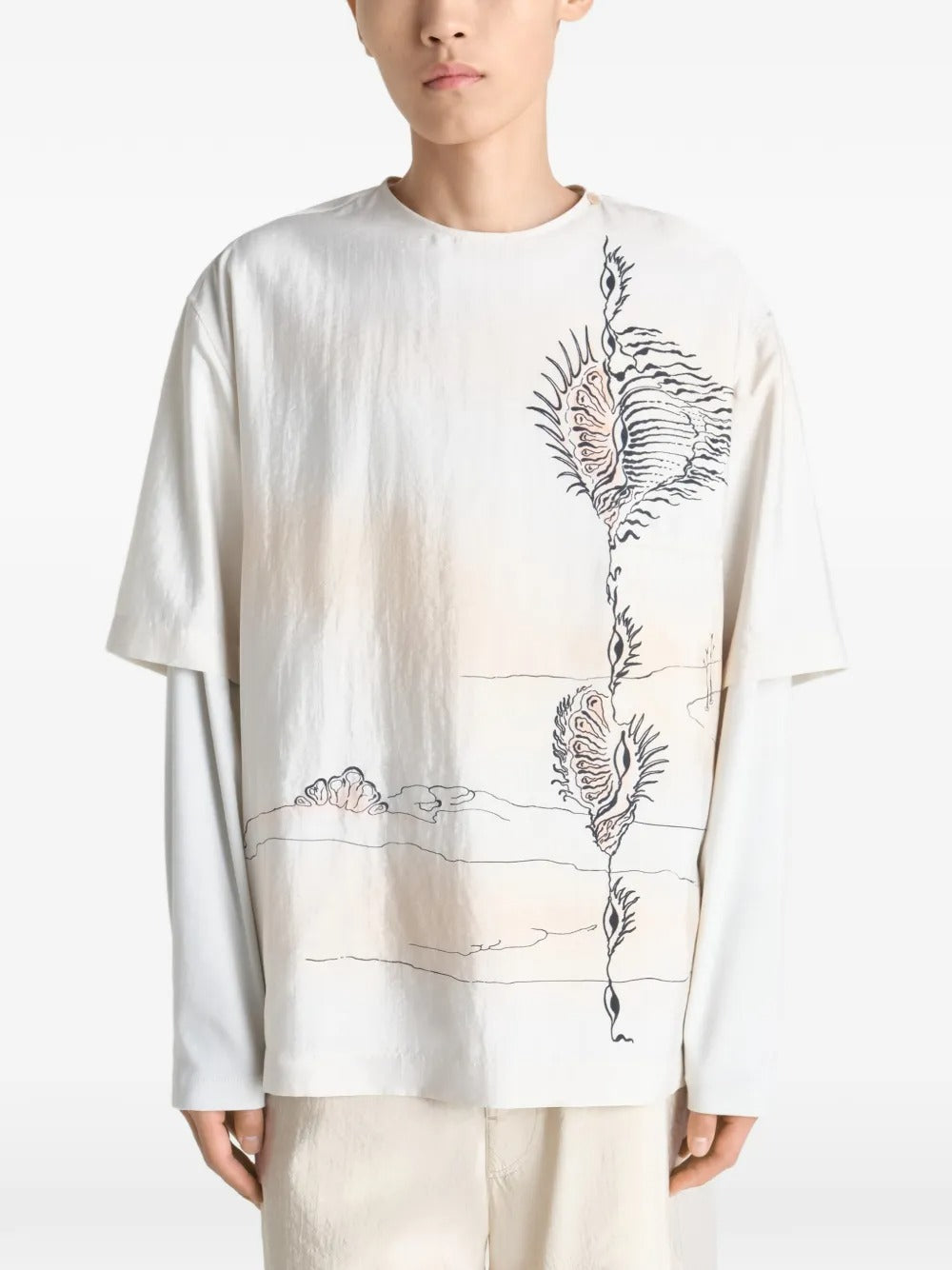 White tops worn by a person, showing the tops fit