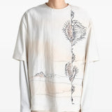 White tops worn by a person, showing the tops fit