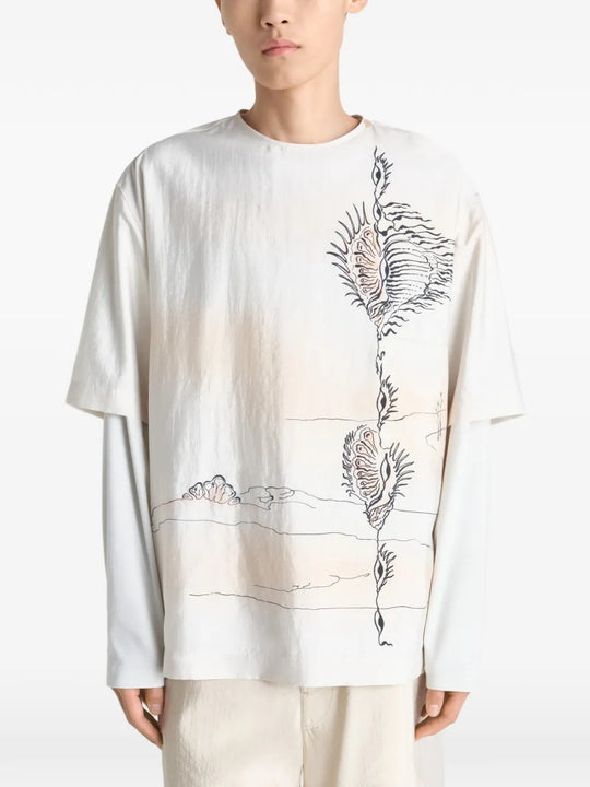 White tops worn by a person, showing the tops fit