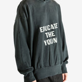 Black hoodie worn by a person, showing the hoodie's fit