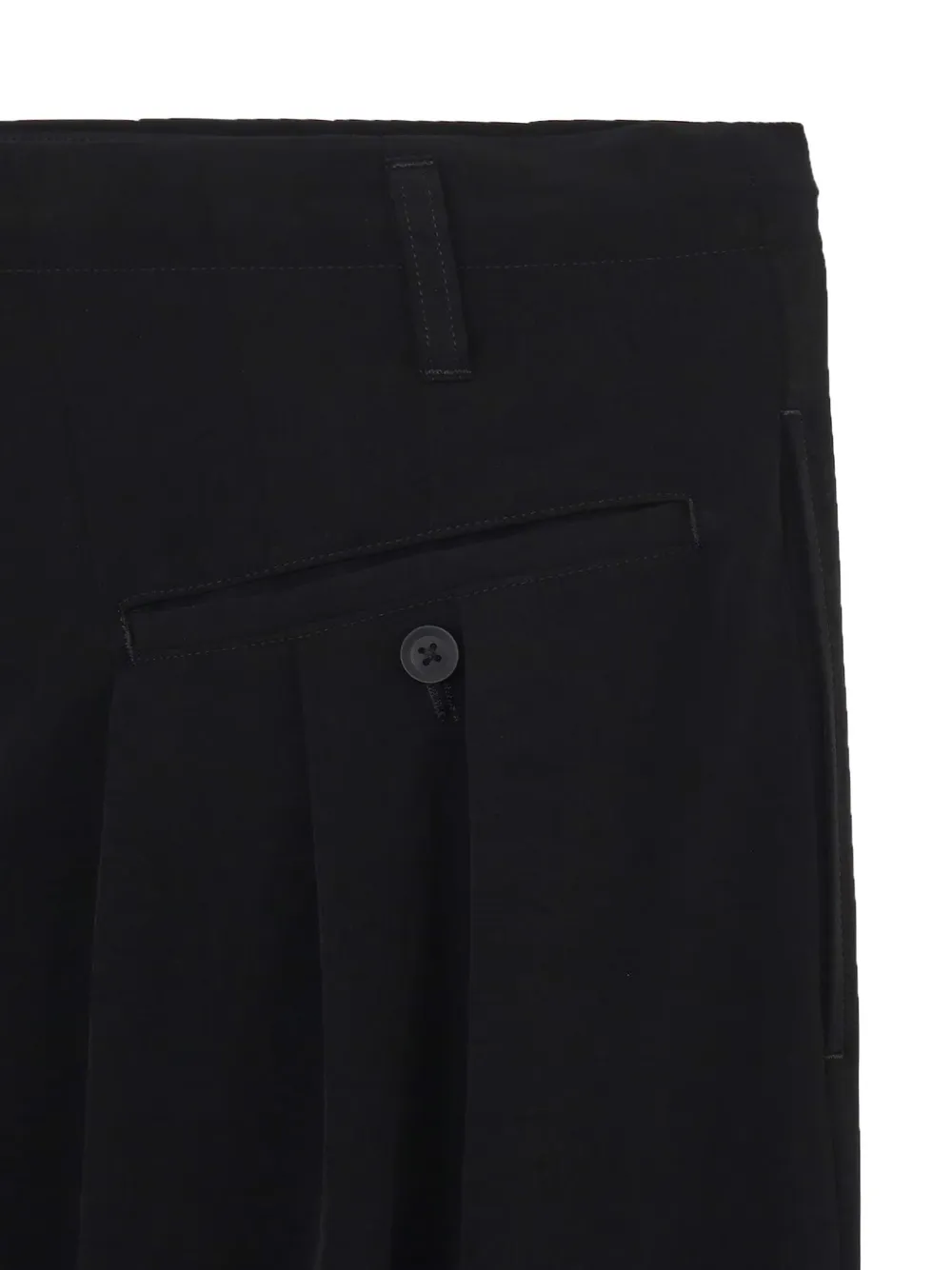 Close up of black pant, showing texture of the triacetate fabric