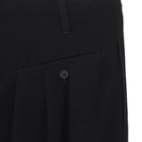Close up of black pant, showing texture of the triacetate fabric