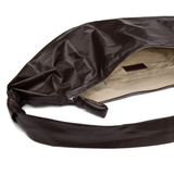 Close up of the brown bag, showing texture of the cotton fabric