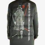 Black jacket worn by a person, showing the jacket's fit