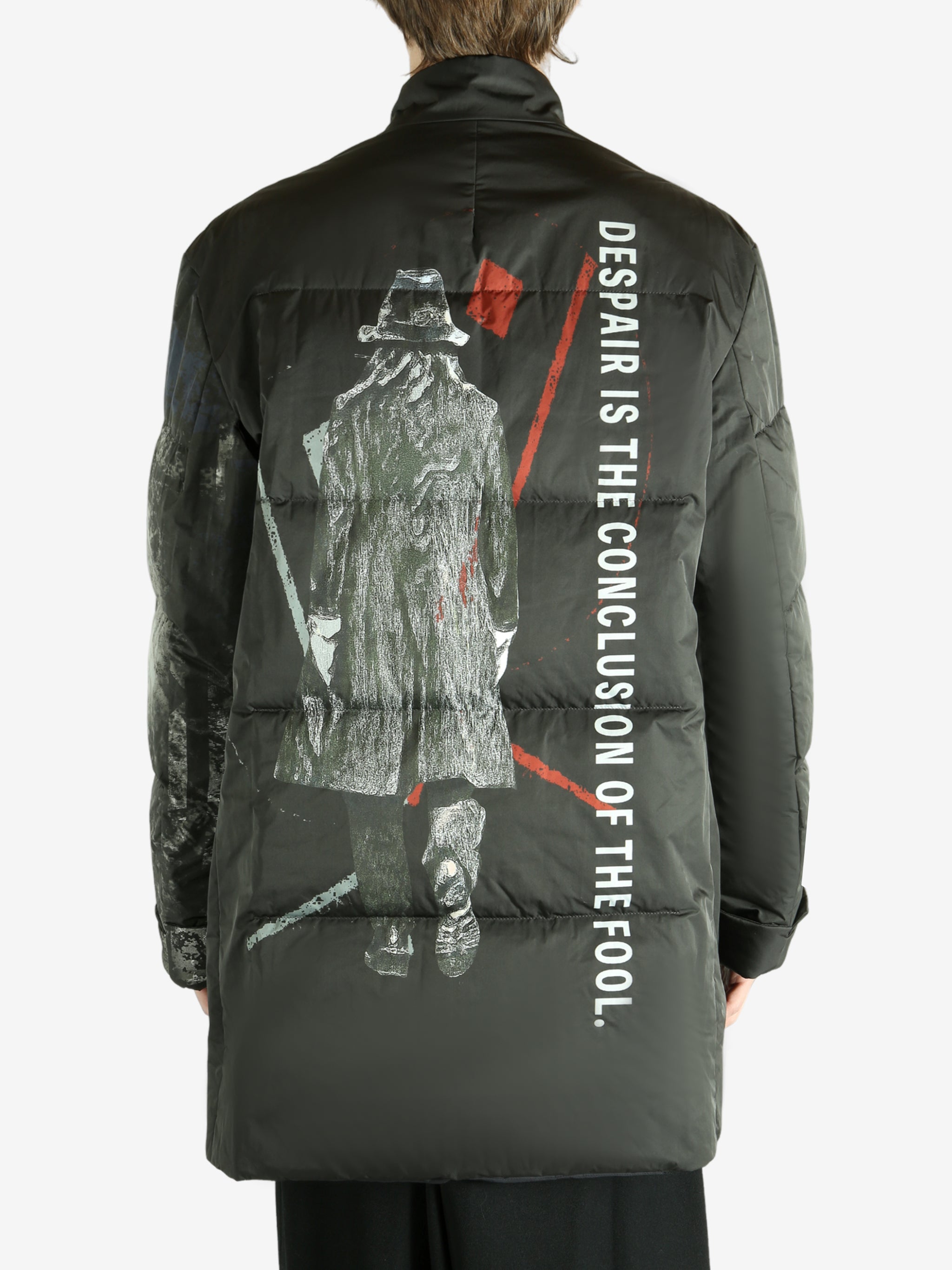 Black jacket worn by a person, showing the jacket's fit