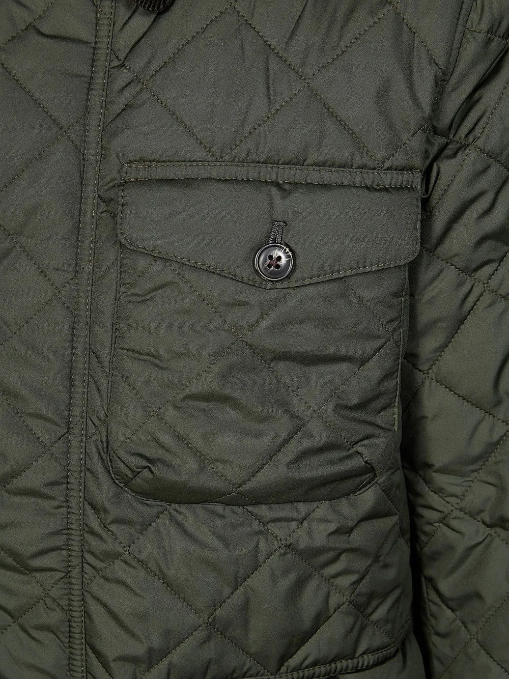 Close up of Green jacket, showing texture of the 100% polyester/ 100% cotton fabric
