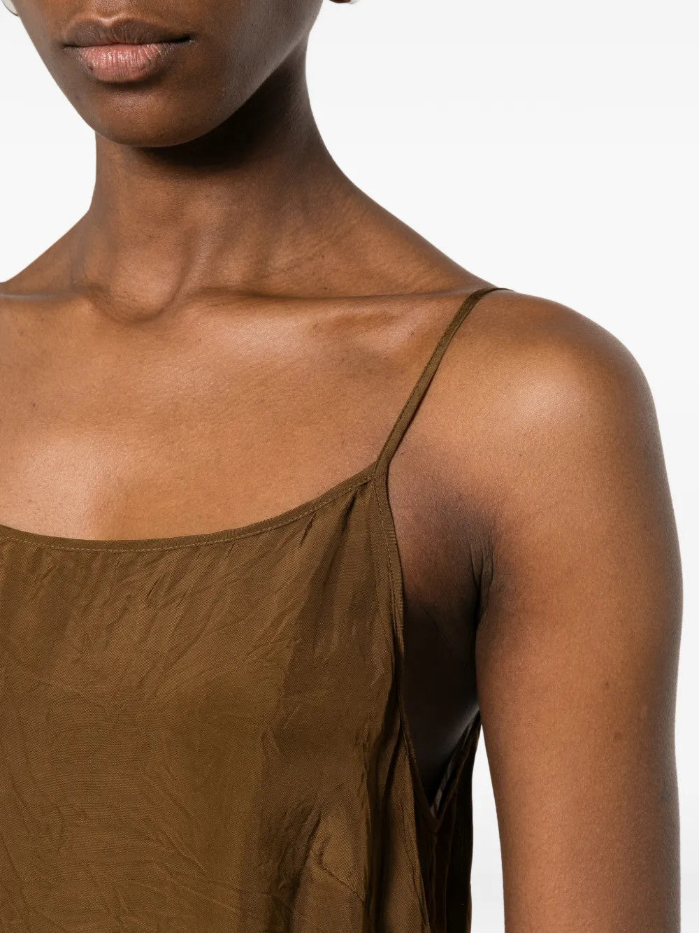 Brown dress worn by a person, showing the dress fit