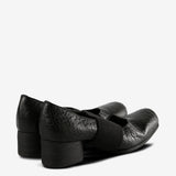 Black shoes, back view