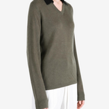 Green t-shirt worn by a person, showing the t-shirt fit