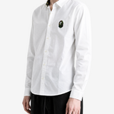 White shirt worn by a person, showing the shirt fit