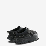 black sneakers, side view