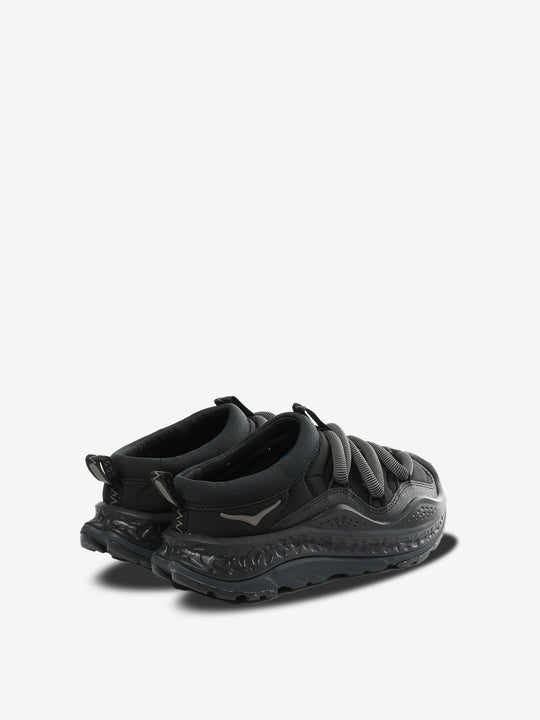 black sneakers, side view