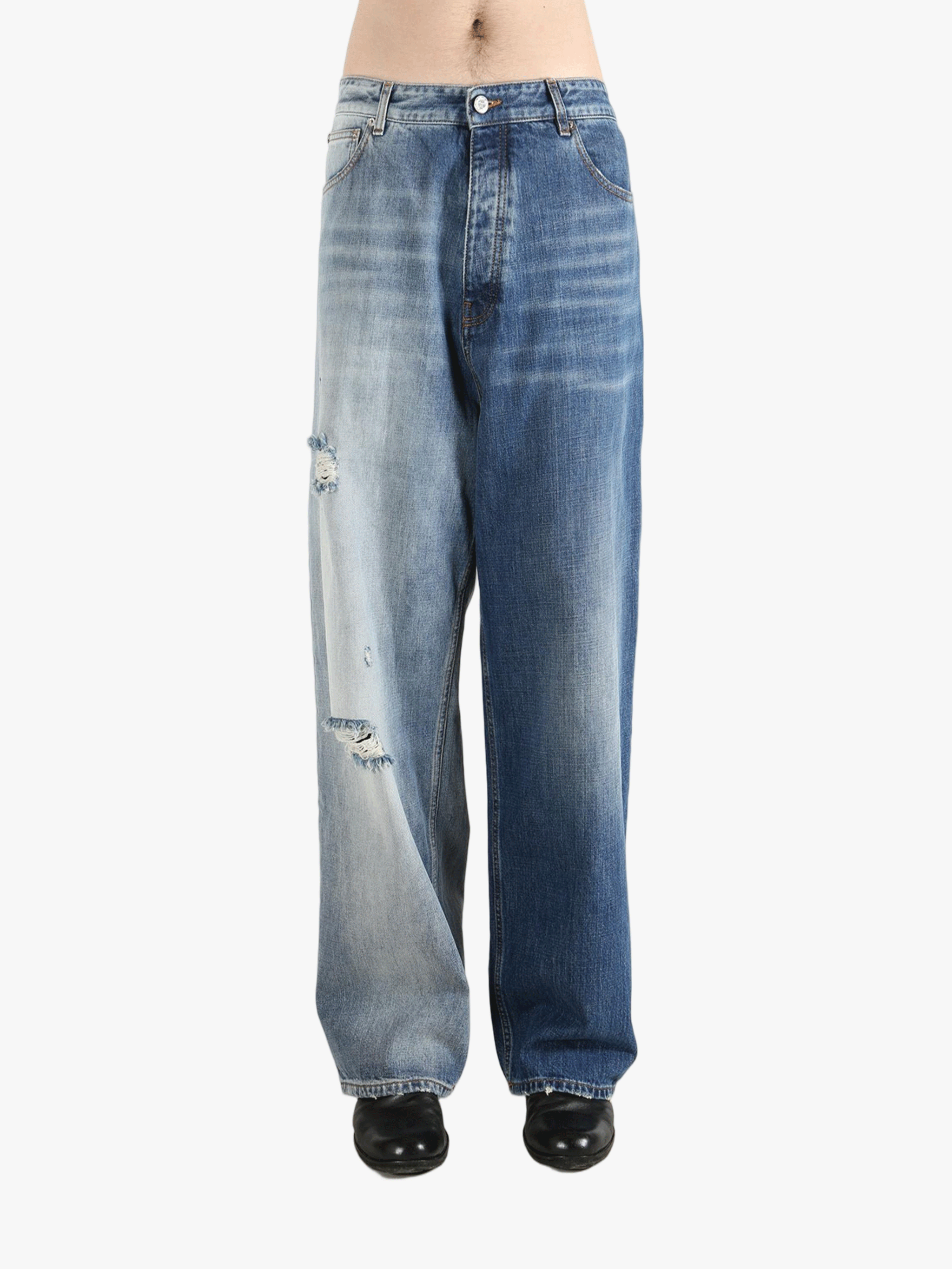 blue jeans worn by a person, showing the jeans  fit