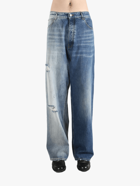 blue jeans worn by a person, showing the jeans  fit