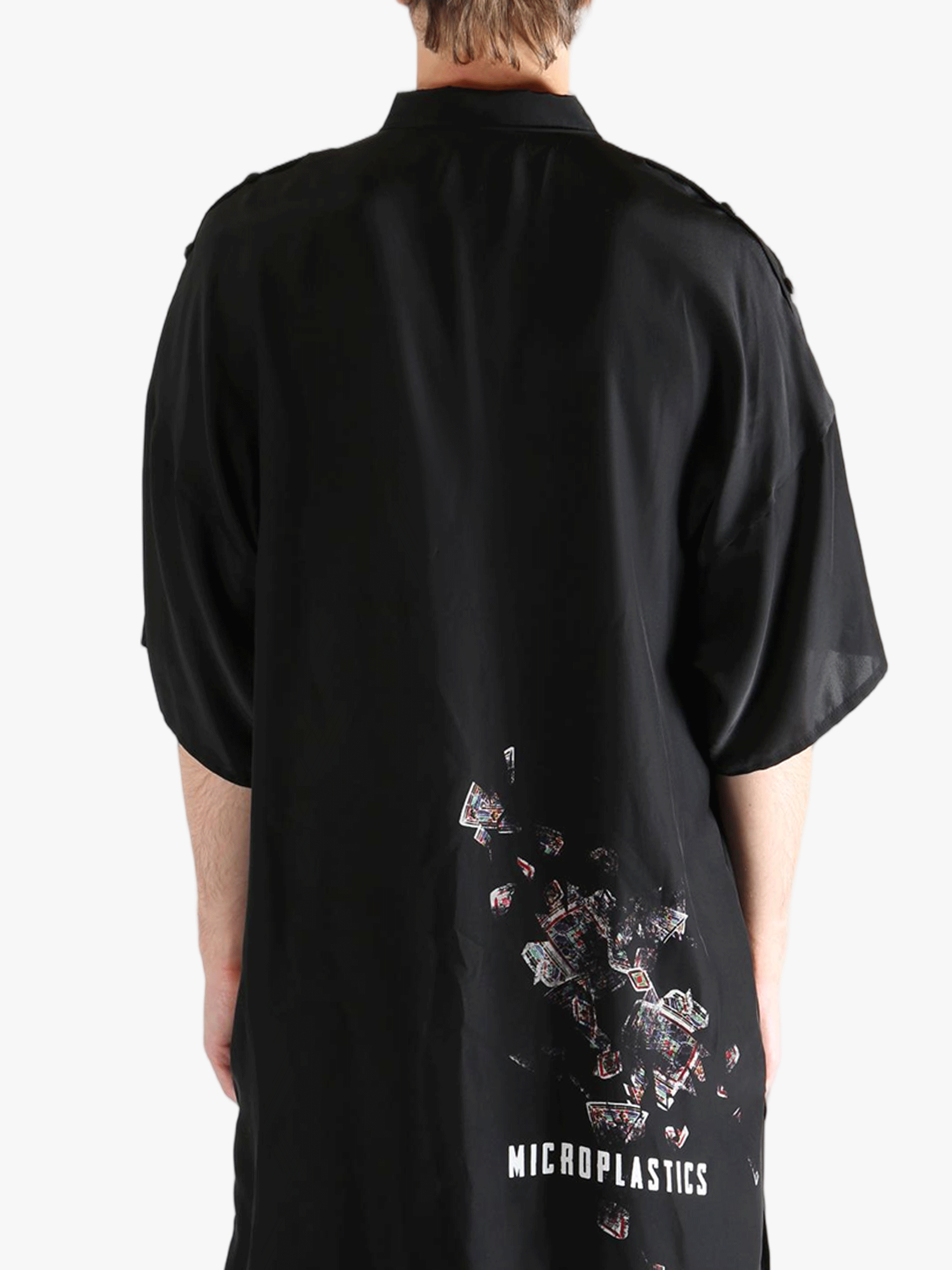 Black jacket worn by a person, showing the jacket's fit