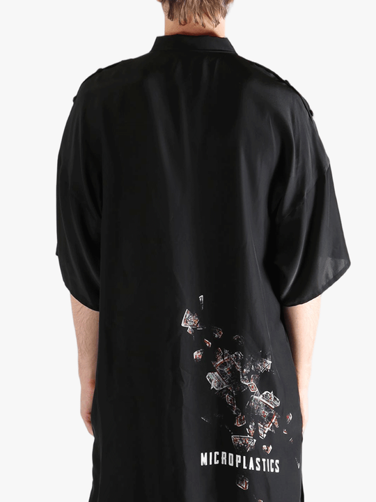 Black jacket worn by a person, showing the jacket's fit