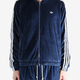 Navy hoodie worn by a person, showing the hoodie's fit