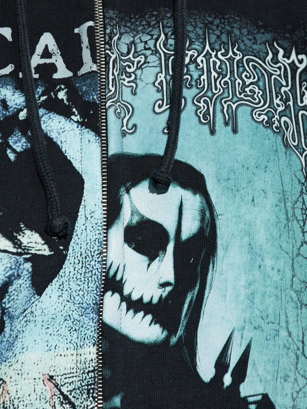 Close up of black hoodie,showing texture of the cotton fabric.