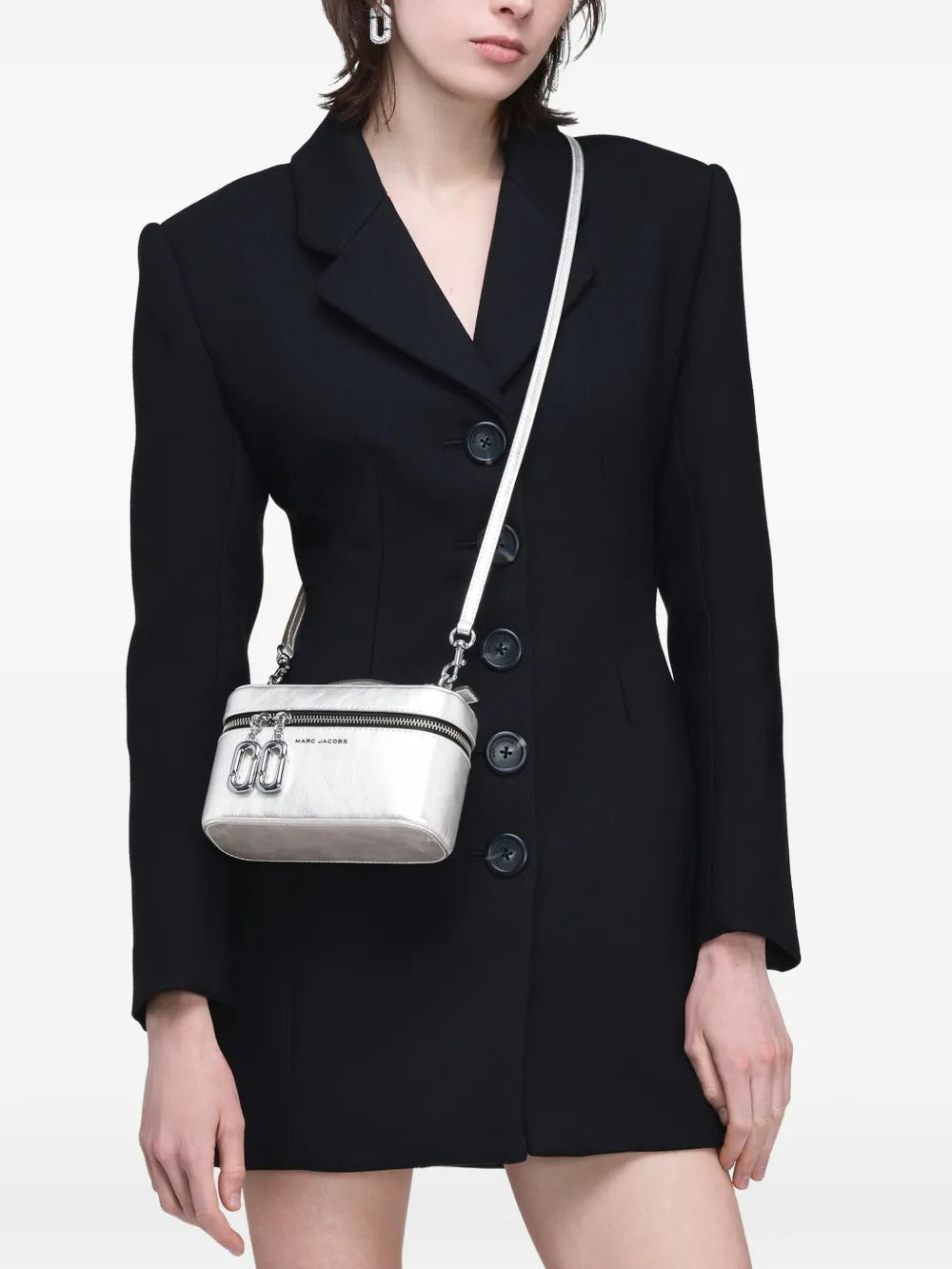 Grey bag worn by a person, showing the bag's fit