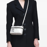 Grey bag worn by a person, showing the bag's fit