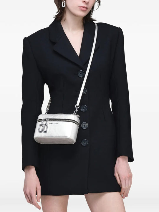 Grey bag worn by a person, showing the bag's fit