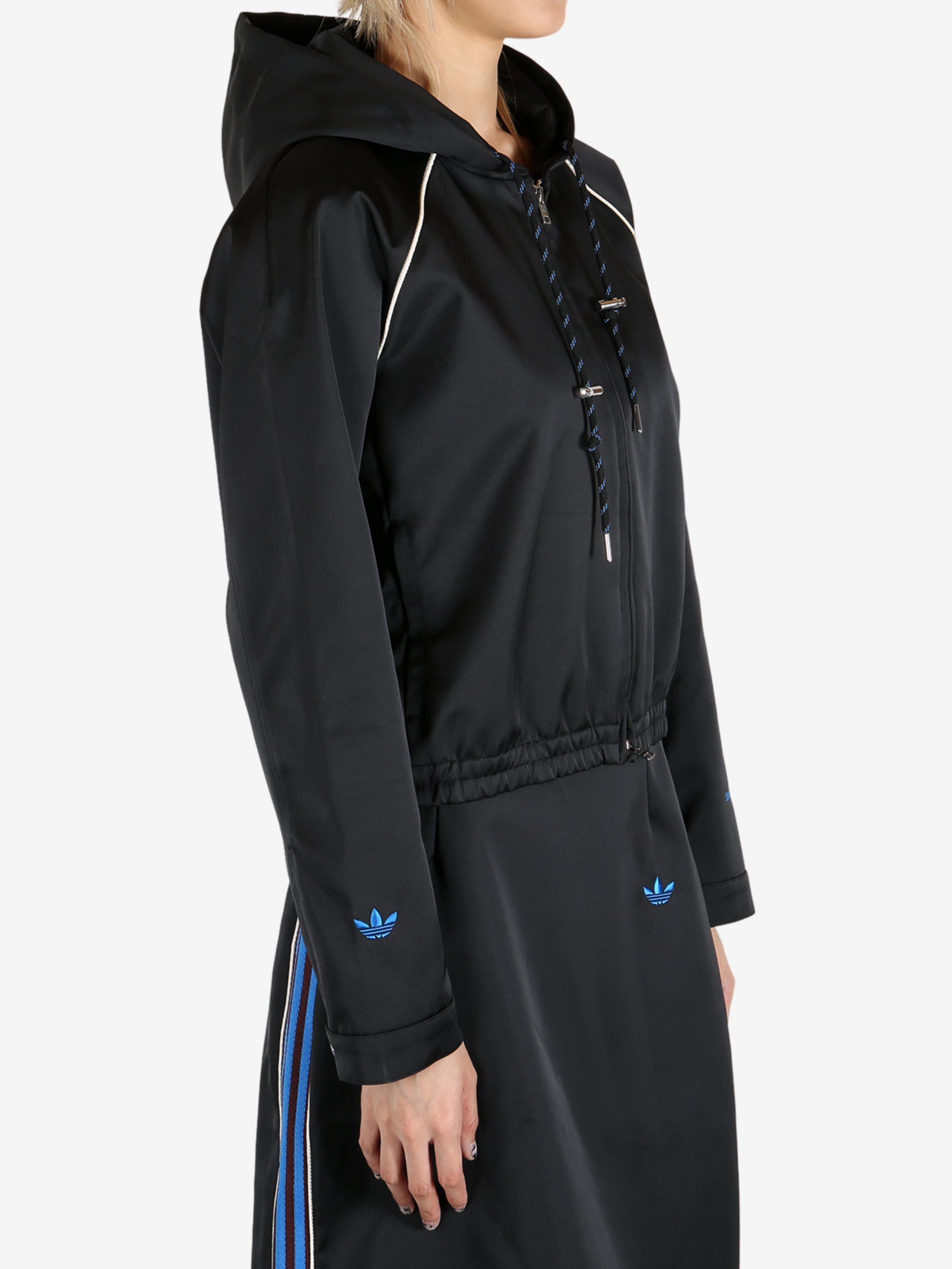 Black hoodie worn by a person, showing the hoodie's fit