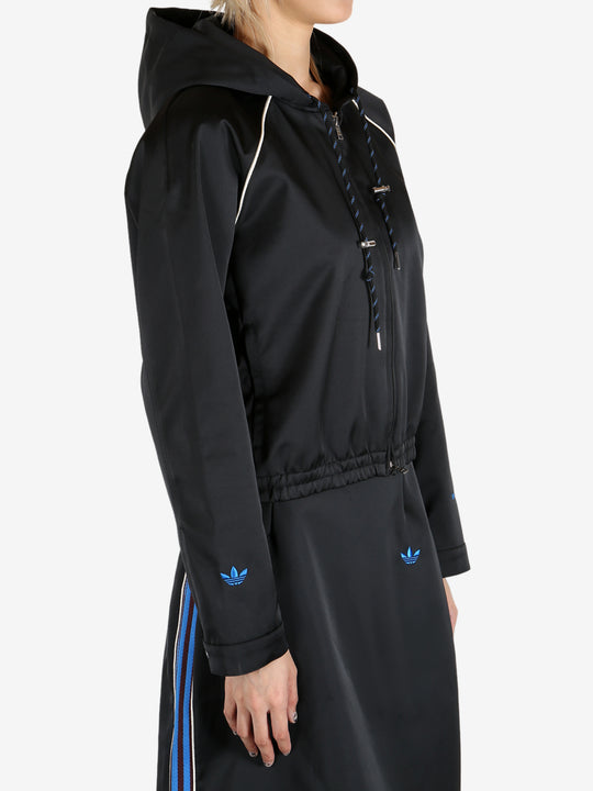 Black hoodie worn by a person, showing the hoodie's fit