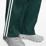 close up of white sneakers, showing texture of the rubber fabric