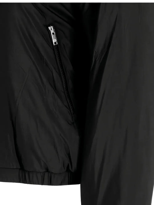 Close up of Black jacket, showing texture of the 100% polyester fabric