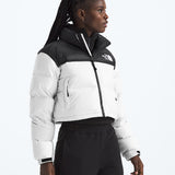 White jacket worn by a person, showing the jacket fit