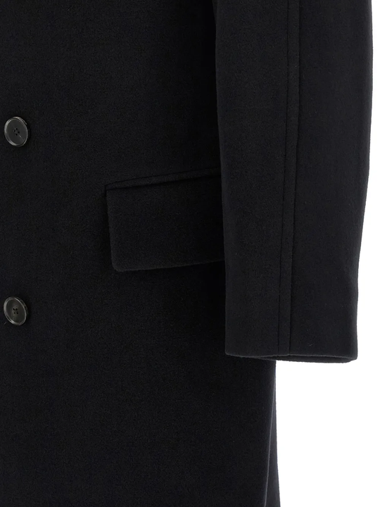 Close up of black jackets, showing texture of the merino fabric