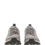 Close up of the grey sneakers, showing texture of the recycled polyester fabric