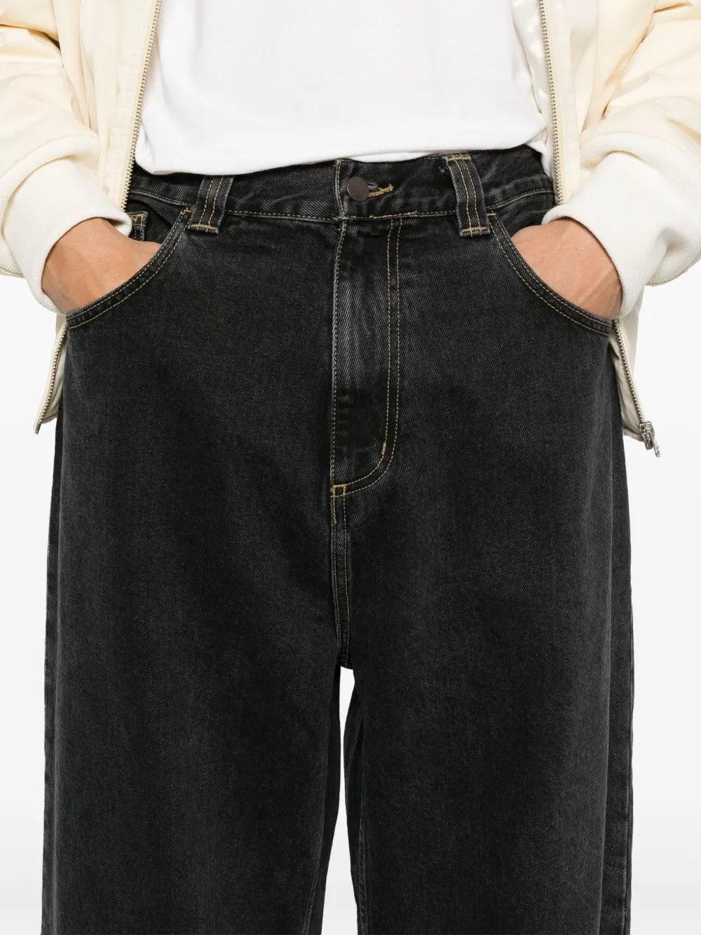 Close up of blue pants, showing texture of the cotton fabric