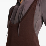 Close up of brown dresses, showing texture of the viscose fabric