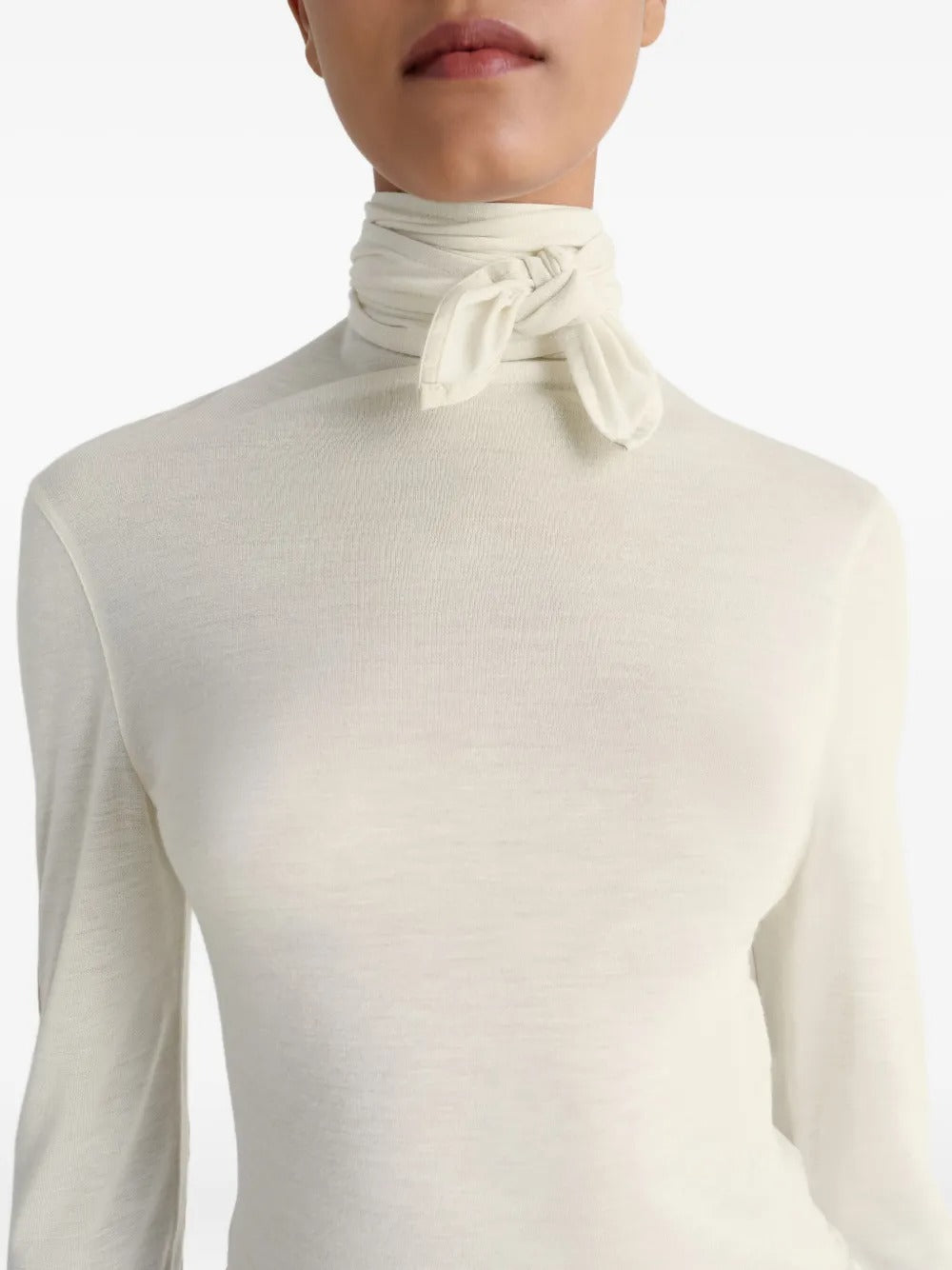 Close up of white top, showing texture of the viscose fabric