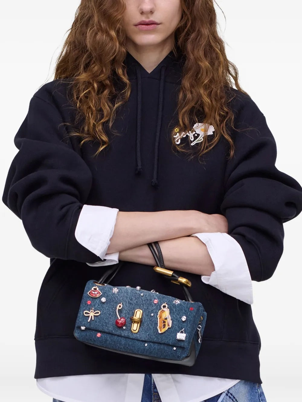 Blue bags worn by a person, showing the bags fit