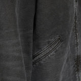 Close up of Black jacket, showing texture of the 100% cotton fabric