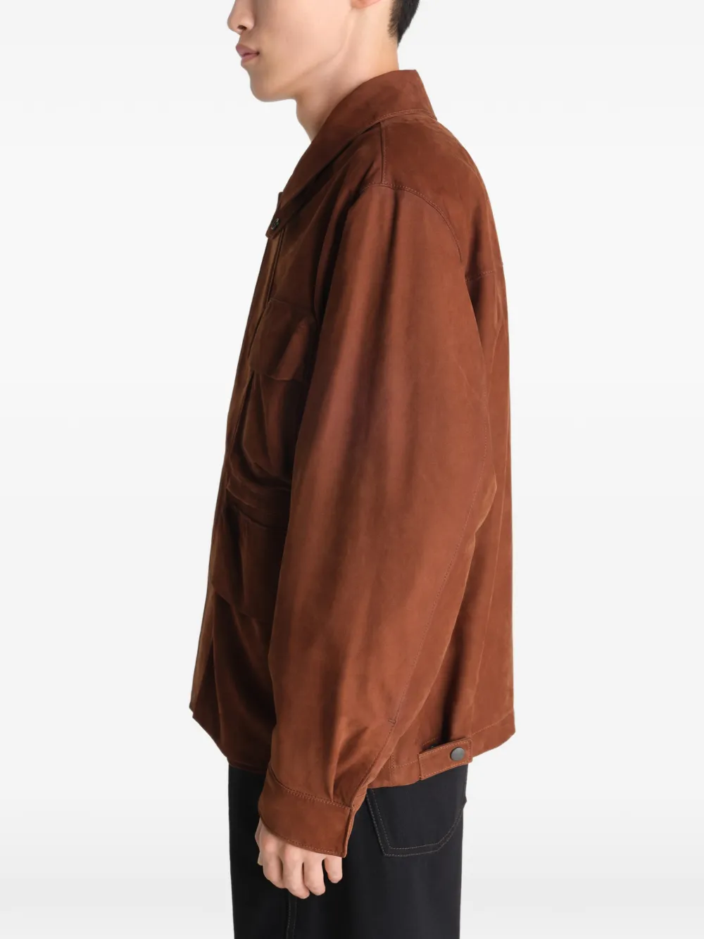 Brown jackets-coats worn by a person, showing the jackets-coats's fit