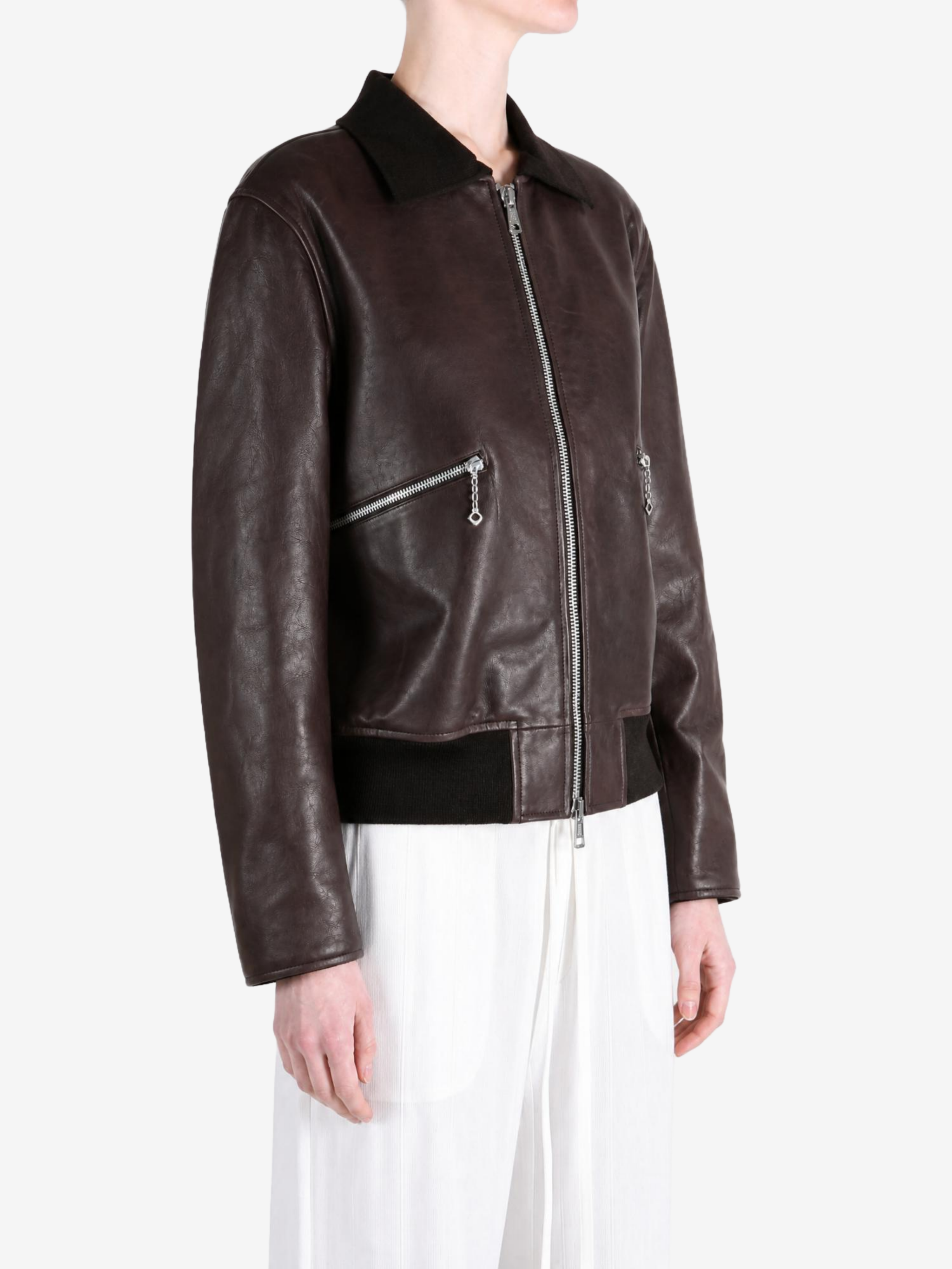 Brown jacket worn by a person, showing the jacket fit