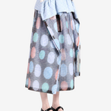Blue skirt worn by a person, showing the skirt fit