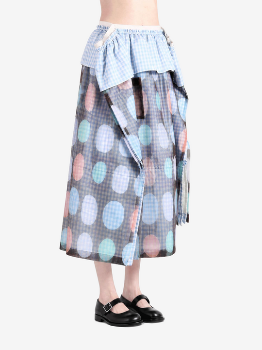 Blue skirt worn by a person, showing the skirt fit