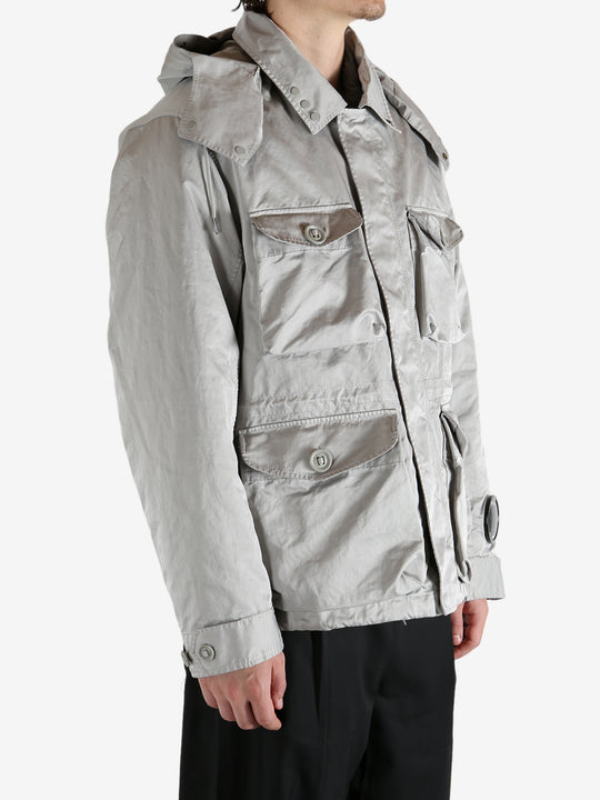 Grey jacket worn by a person, showing the jacket's fit