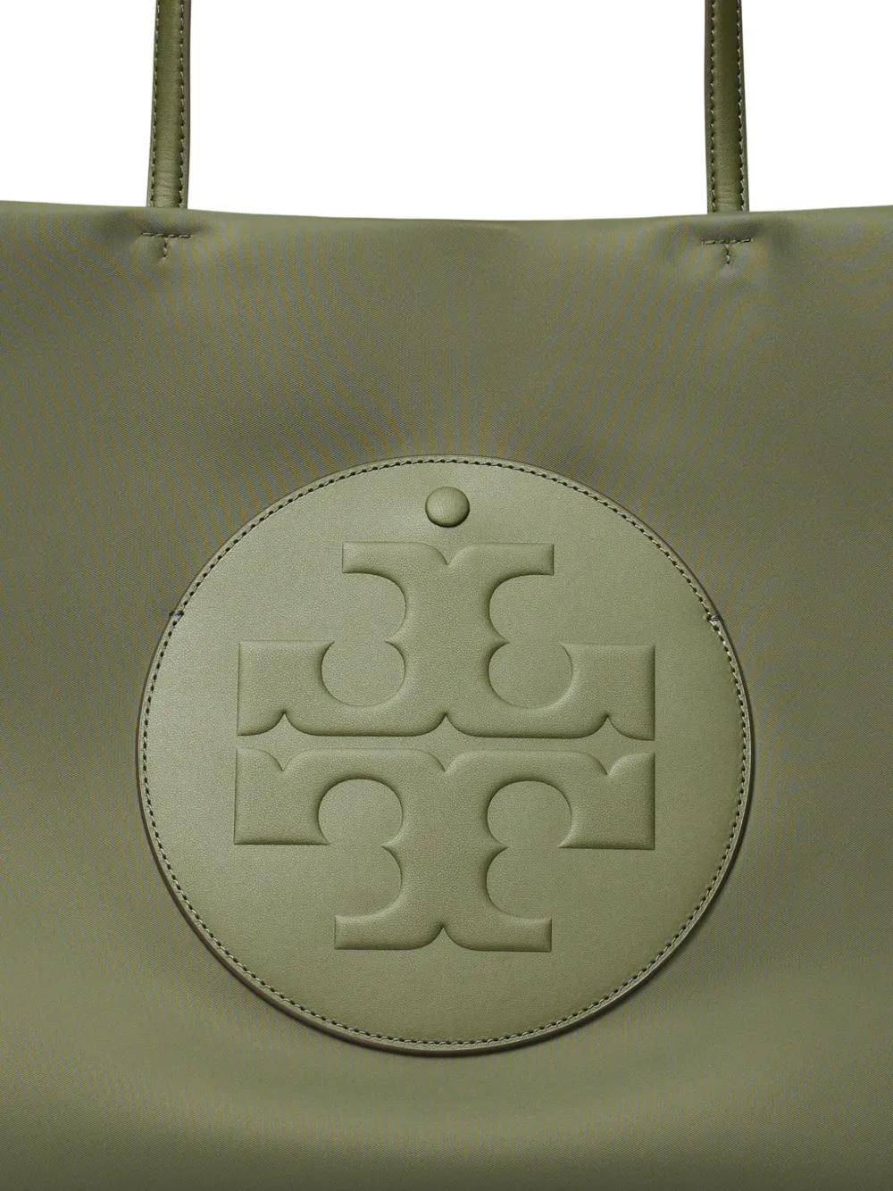 Close up of green bag, showing texture of the Recycled polyester fabric