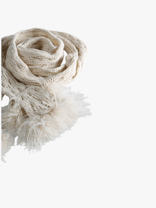 Close up of white scarves, showing texture of the cotton fabric