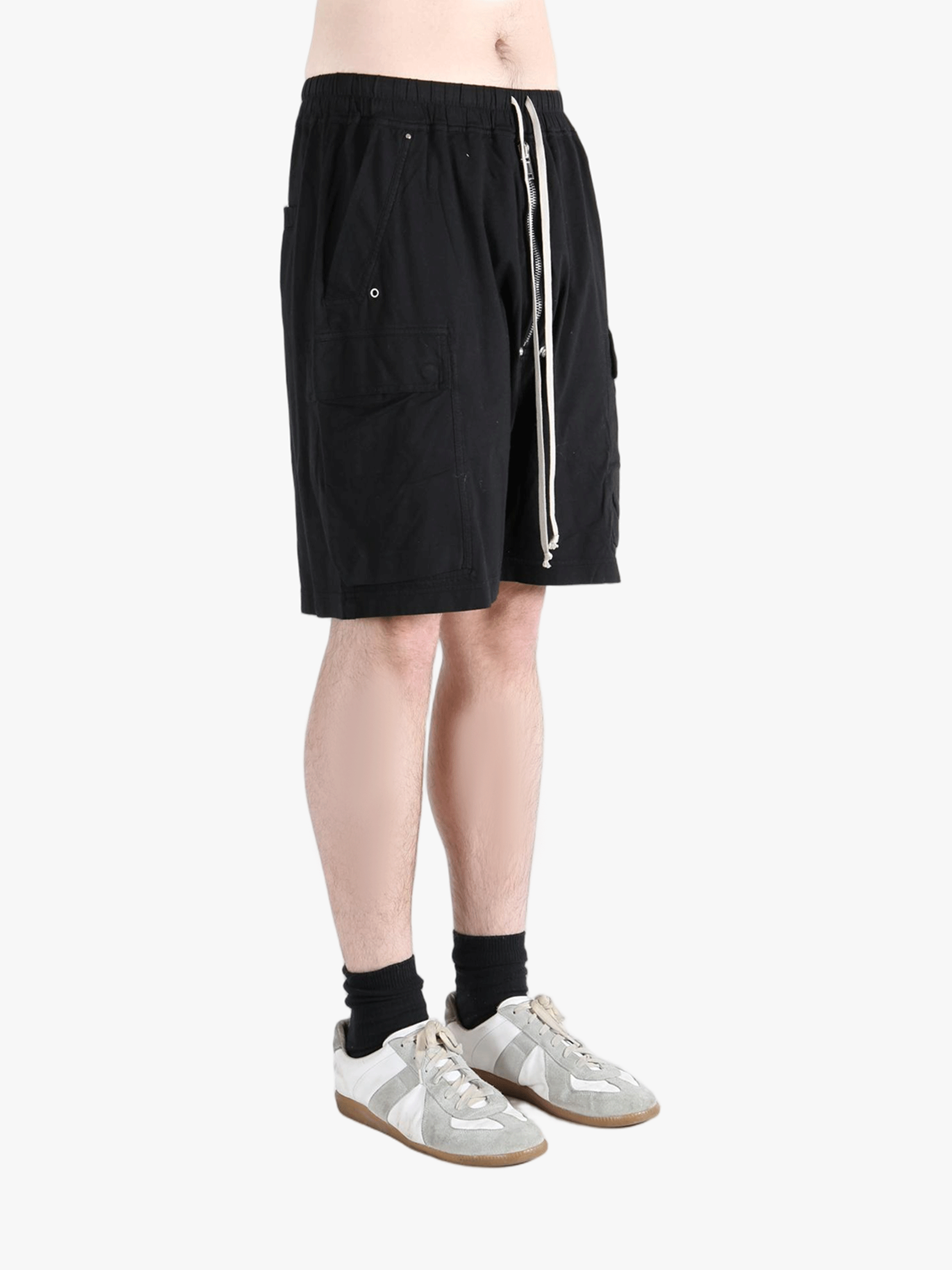 Black shorts worn by a person, showing the shorts fit