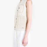 Tan top worn by a person, showing the top fit