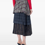 Grey skirt worn by a person, showing the skirt fit