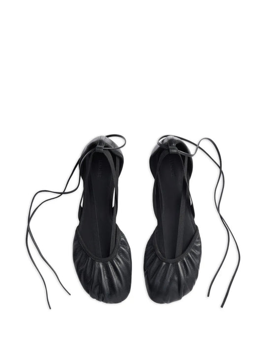 Black flats, front view
