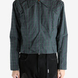 Green blouson worn by a person, showing the blouson's fit